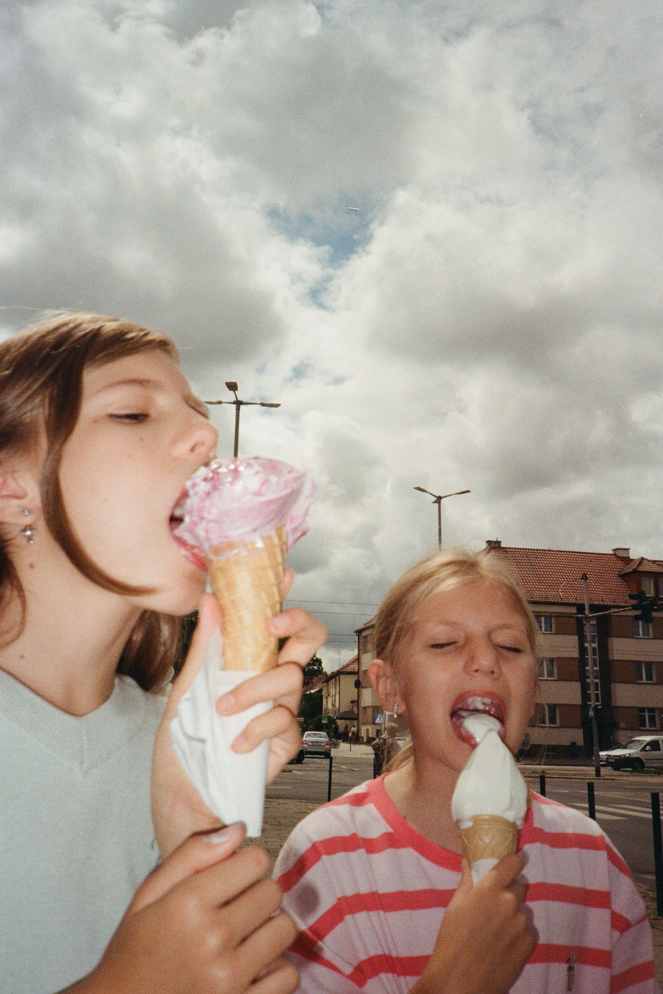 Children enjoying ice cream outdoors